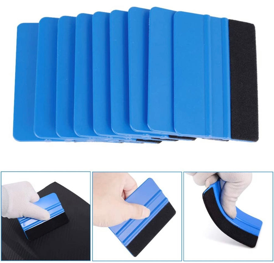 plusieurs raclette de marouflage pour poser un autocollant personnalisé