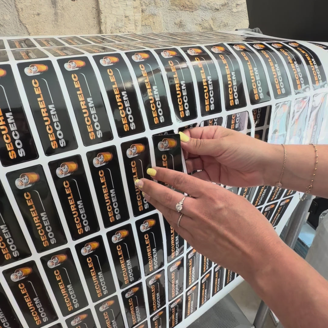 vidéo montrant l'échenillage de stickers pour entreprise 